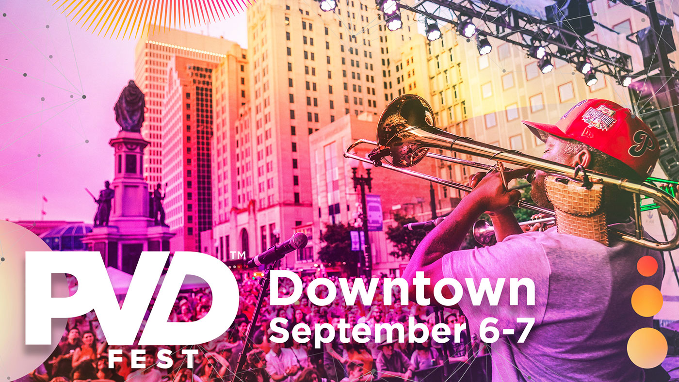 PVDFest - Downtown - September 6 & 7 - Image of a man playing a trombone in front of a crowd in downtown Providence